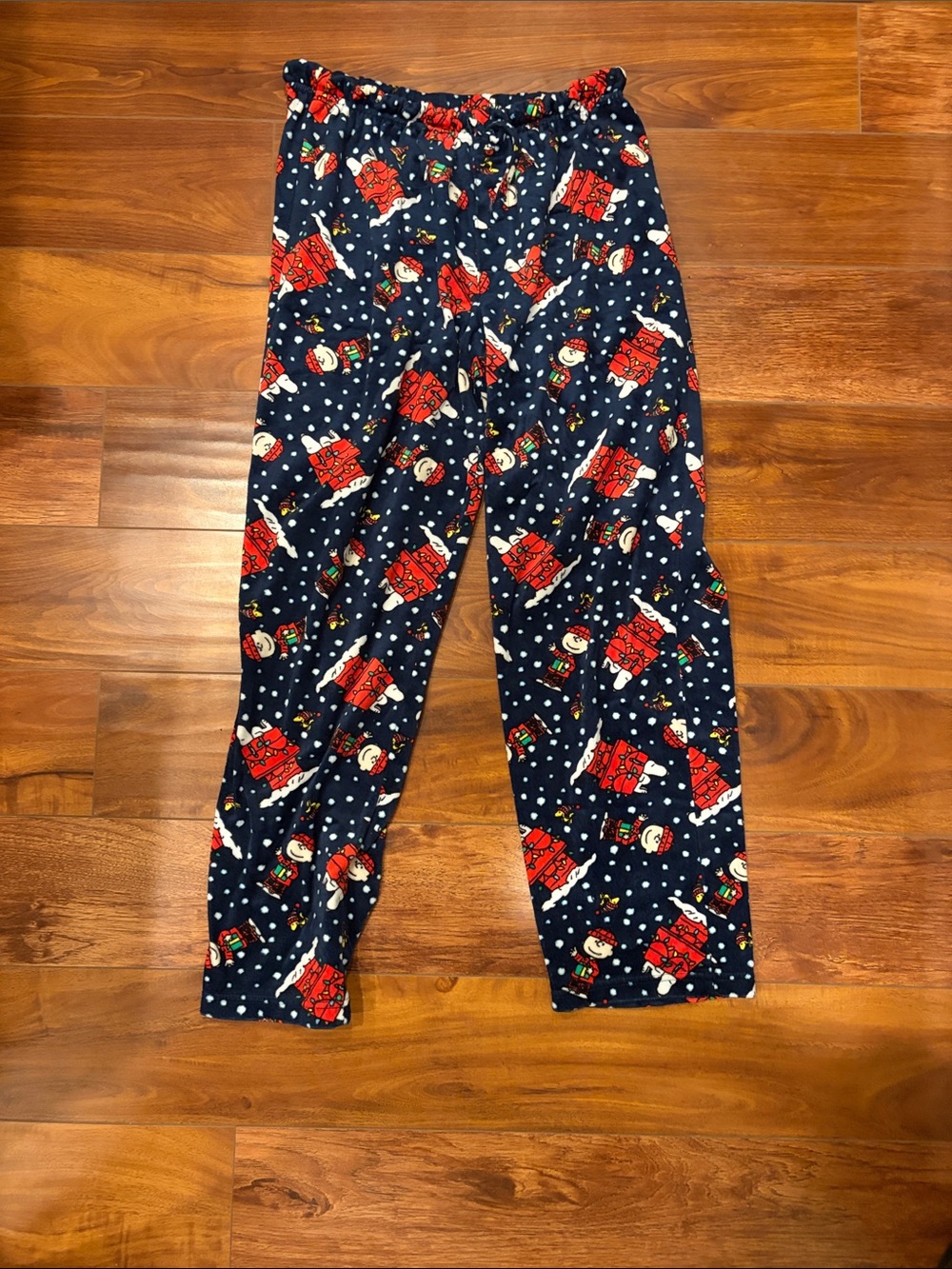 Peanuts Charlie, Snoopy, and Woodstock pajama pants in size small.